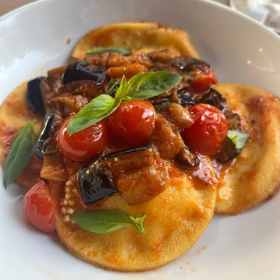 Ravioli with aubergine, cherry tomato and basil