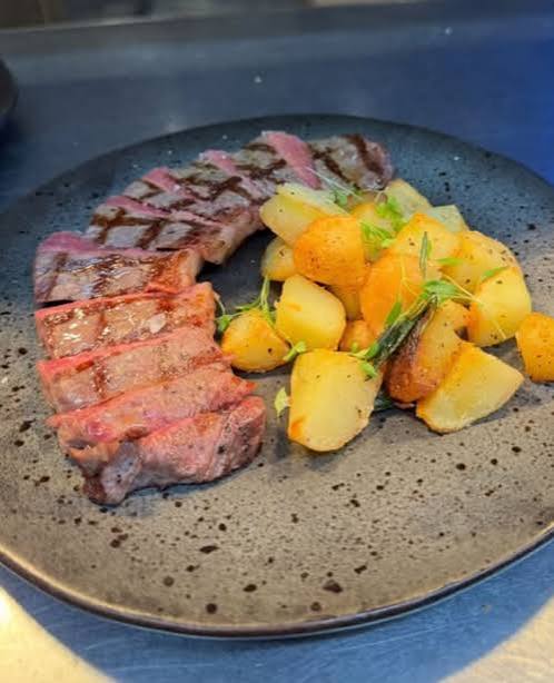 Grilled steak with rosemary roast potatoes